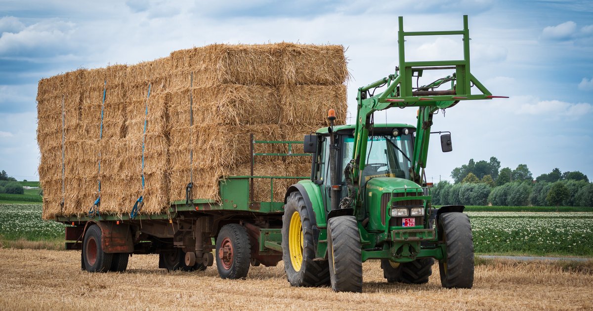 Farmer using tractor to respond to illegal parking blocking a rural field gate entrance