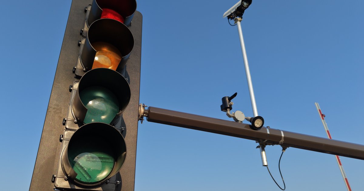 A Flock Safety ALPR camera mounted on a street pole, part of a flock camera map network